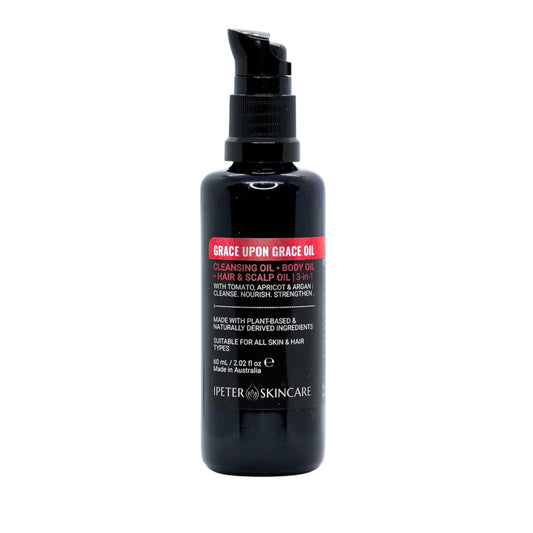 black bottle that contains cleansing oil