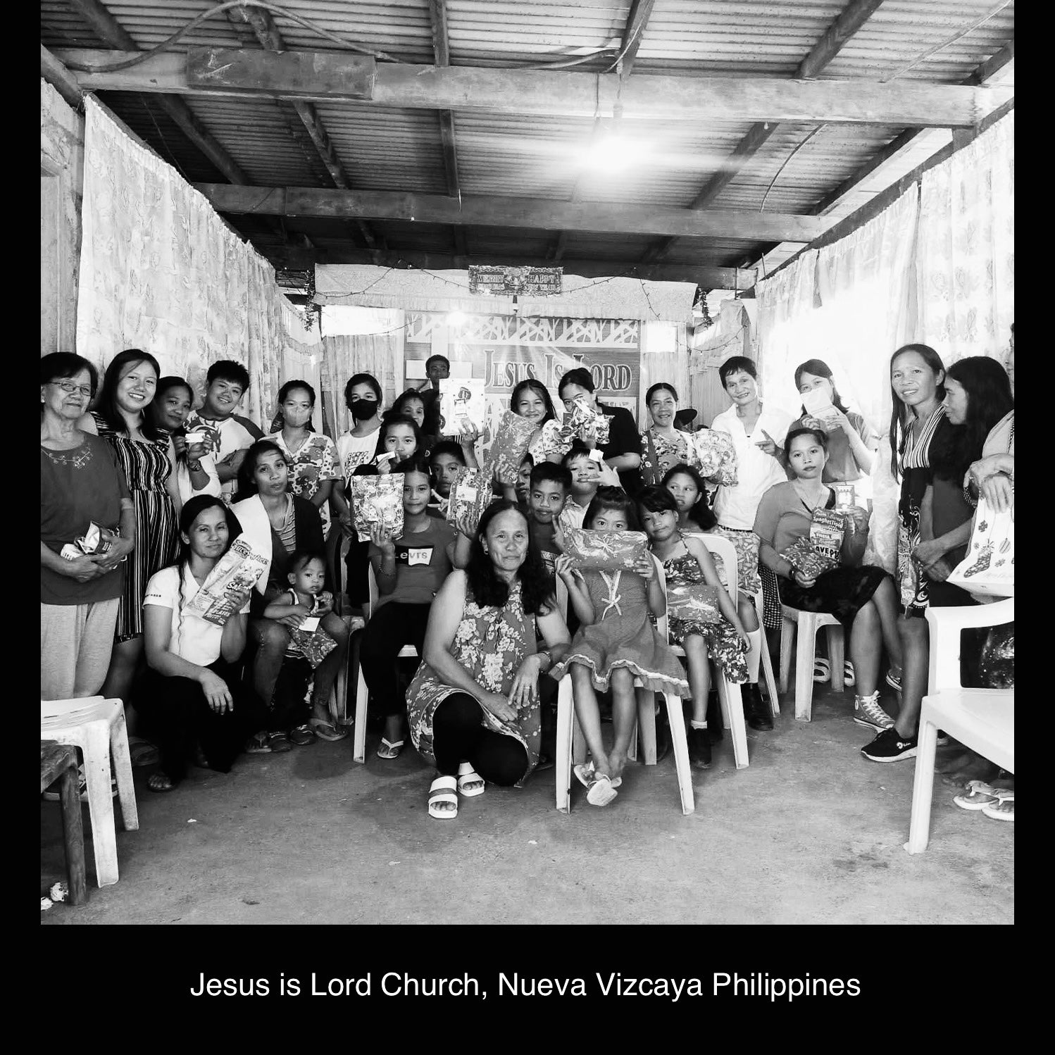 children and women holding gifts